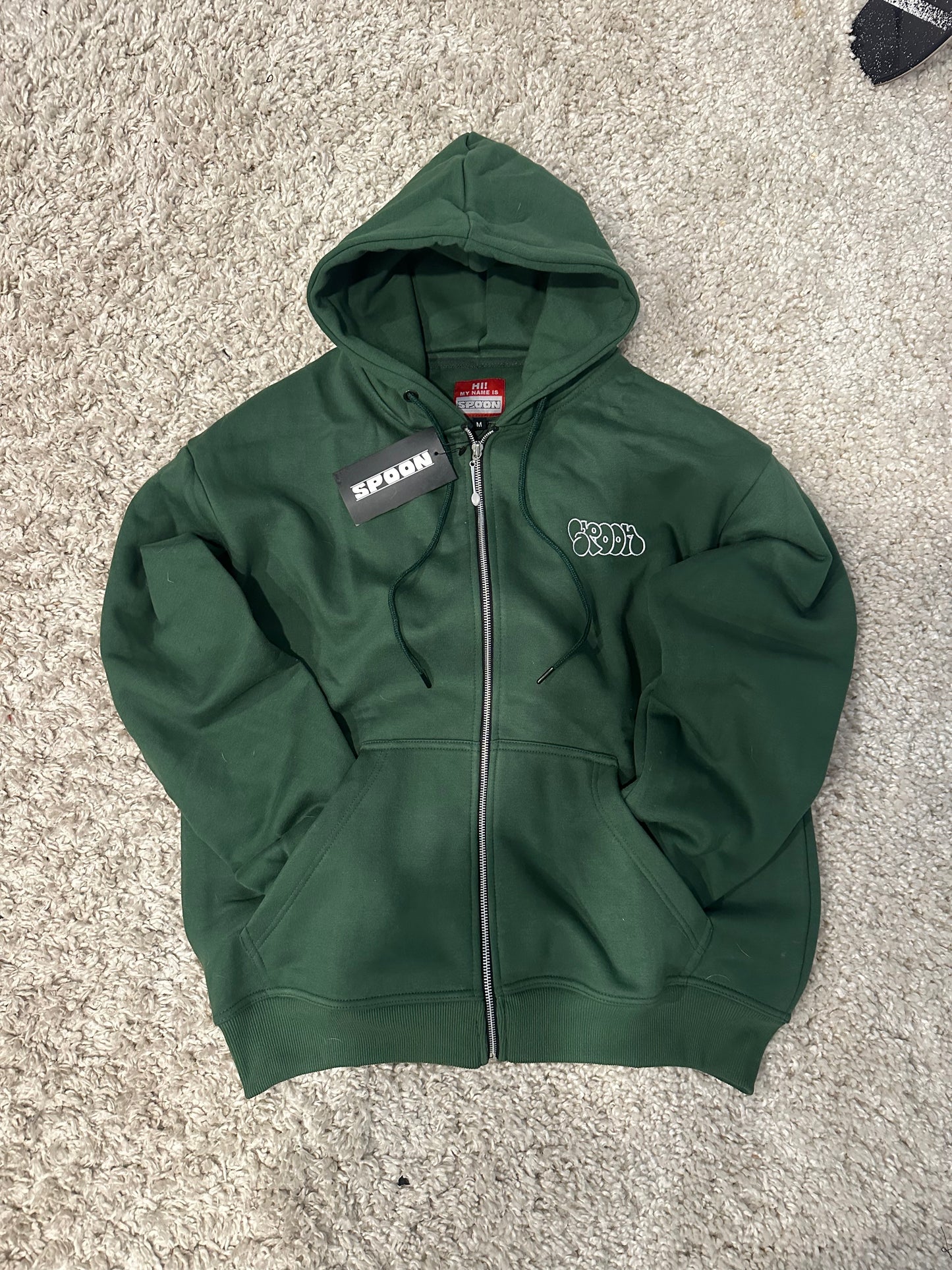 Green zip up
